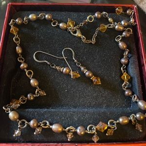 Swarovski, and freshwater pearl necklace and earring set.